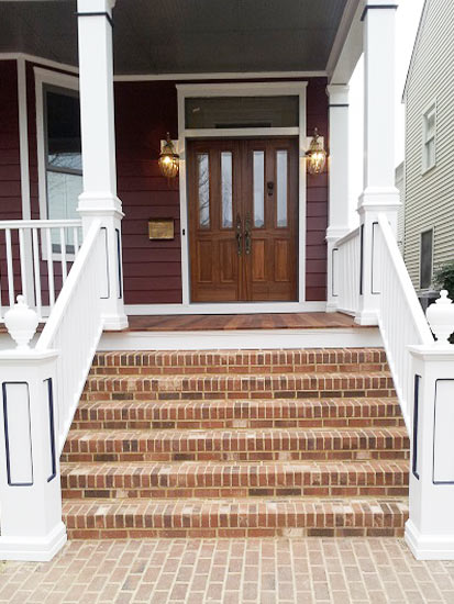 front entryway, covered porch, brick stairs