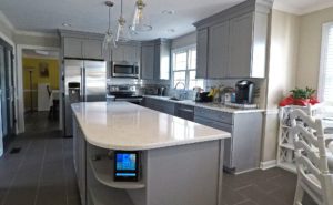 grey kitchen with marble counter tops