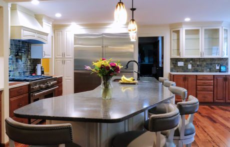 Large open concept kitchen, large sitting island, two toned cabinetry