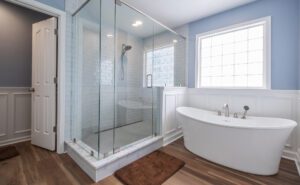 Large master bathroom remodeling project. Soaking tub with large walk in shower with glass doors and walls.