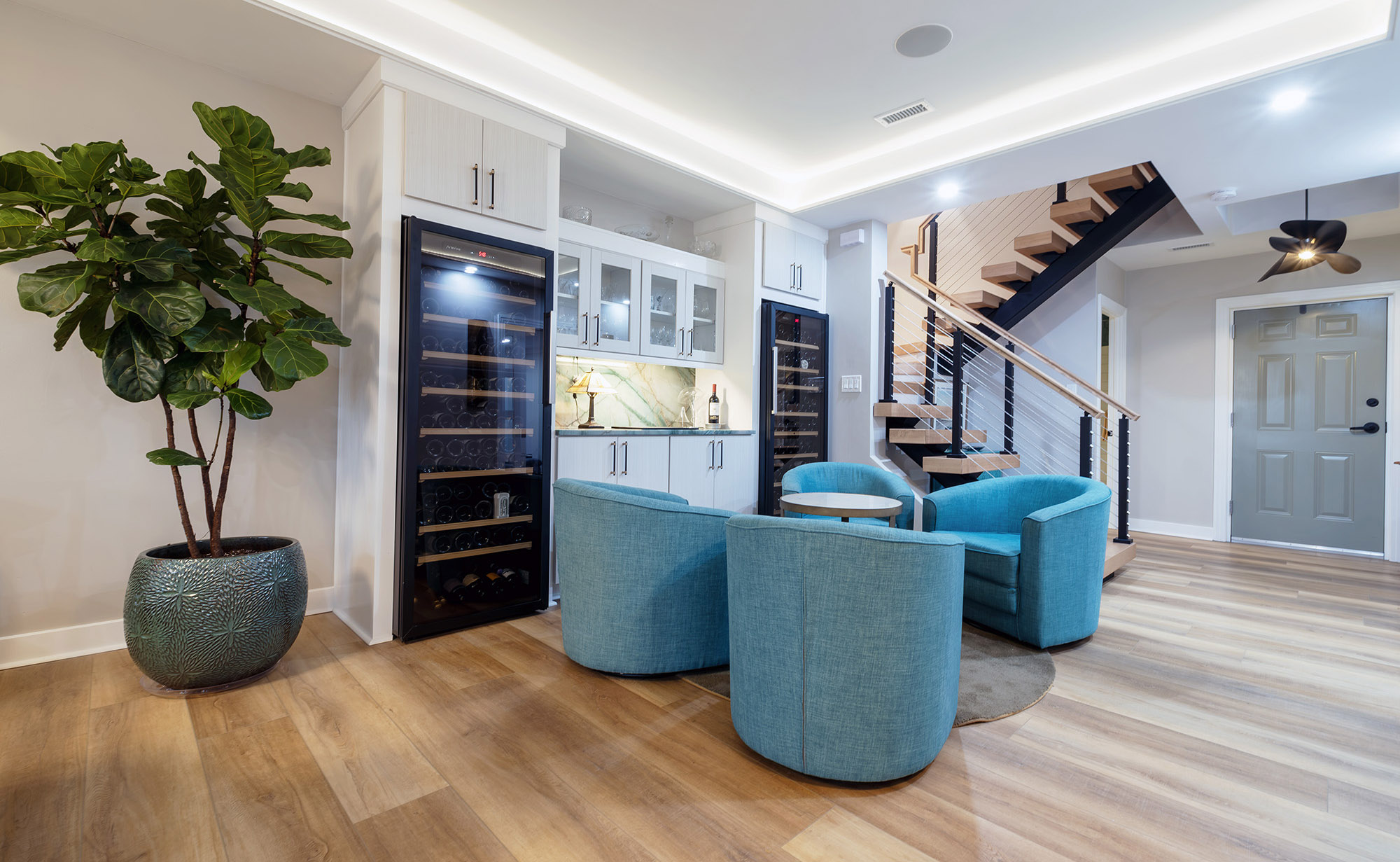 Sitting Area with large built in wine refrigerators